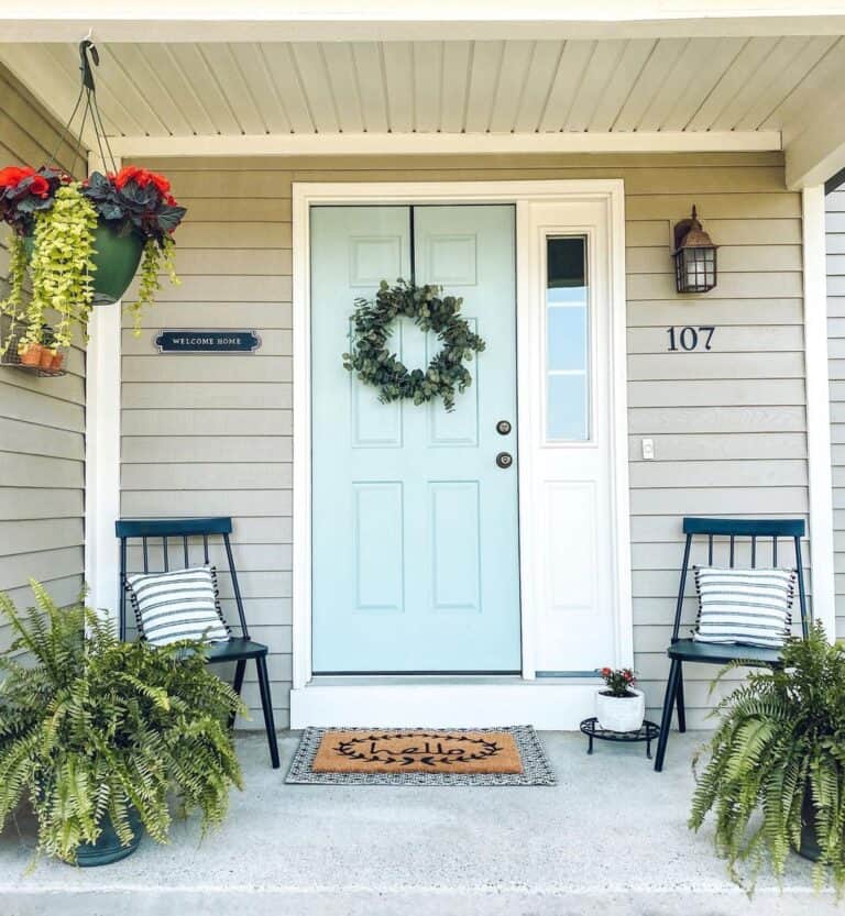 Welcoming Porch with Pale Blue Front Door