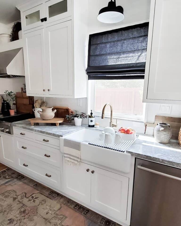 White Apron Sink with Gold Faucet