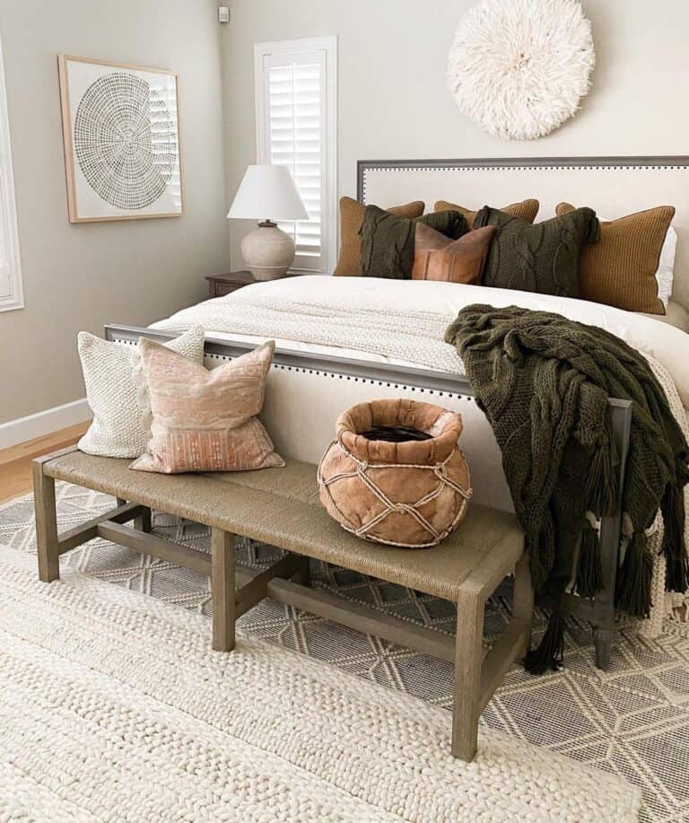 White Bedroom Rug on a Light Grey Rug on a Warm Wood Floor