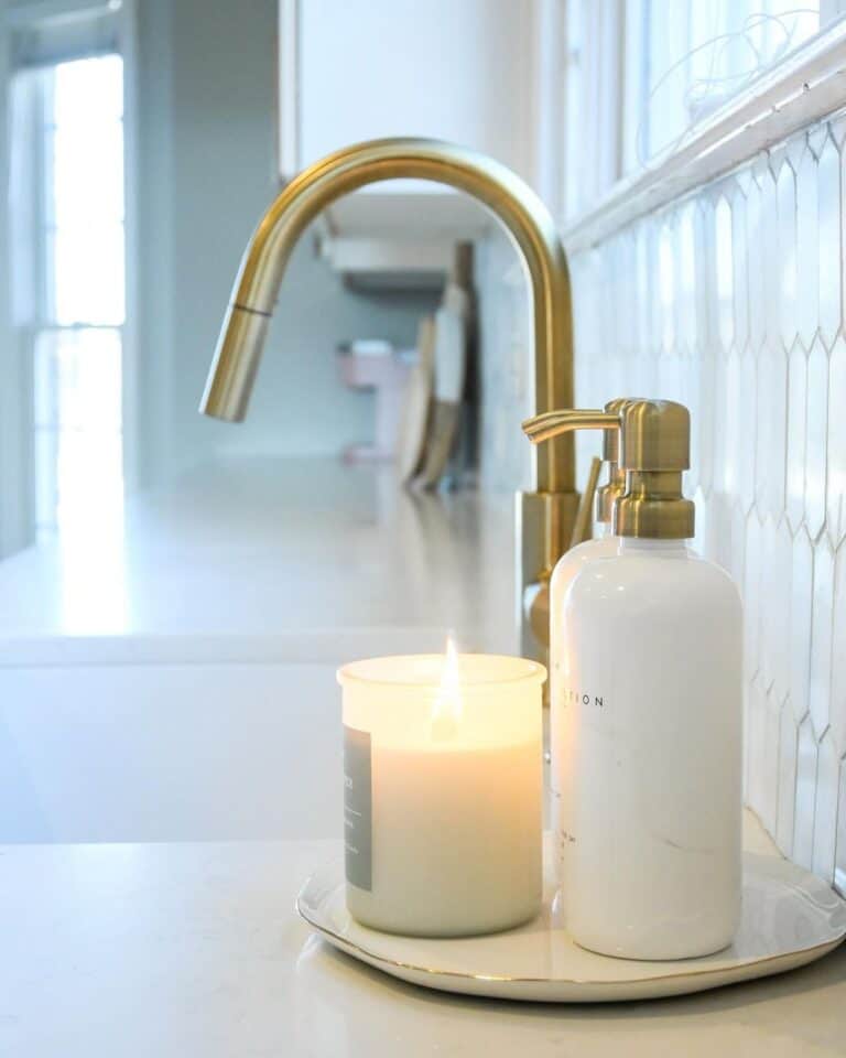 White Bottles and a Brass Kitchen Faucet
