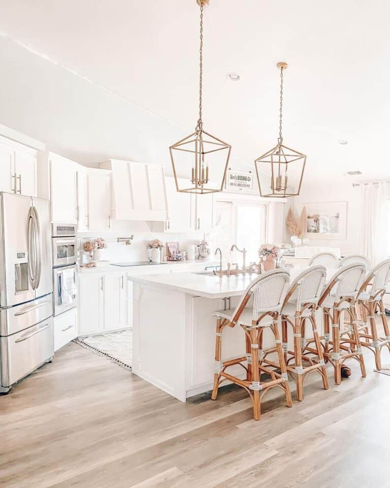 White Cabinet Kitchen with Rattan Chairs