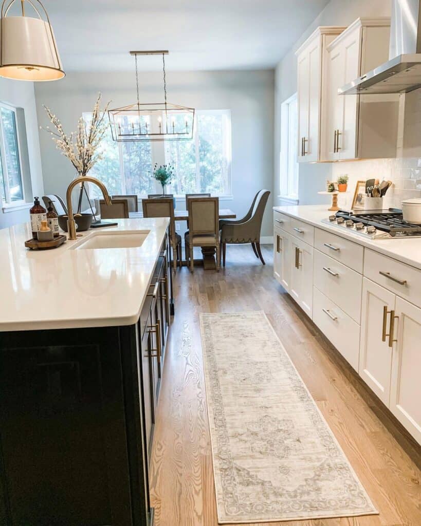 White Cabinets with Black and White Kitchen Island - Soul & Lane