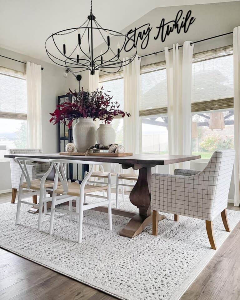 White Dining Room with Curtain Adorned Windows