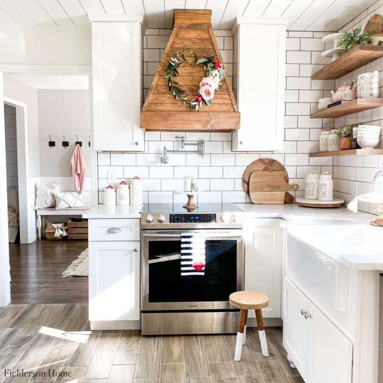 White Farmhouse Kitchen with Light Wood Floating Shelves