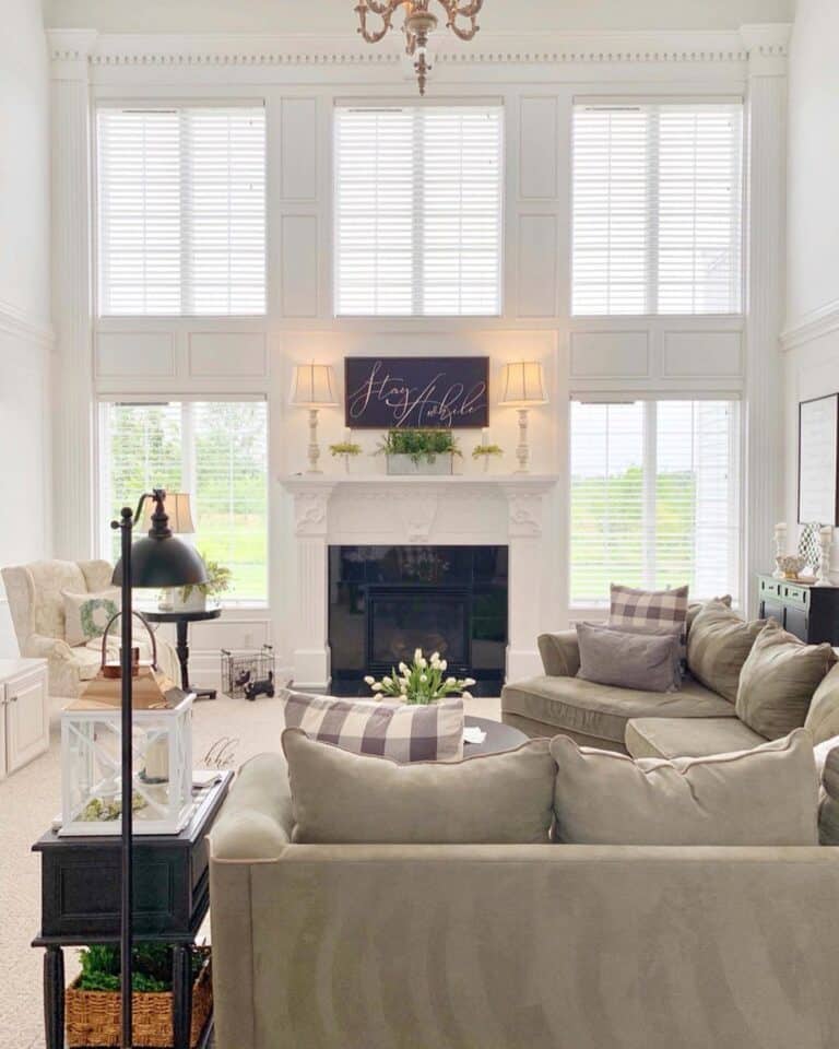 White Fireplace Sconces Surrounded by Windows