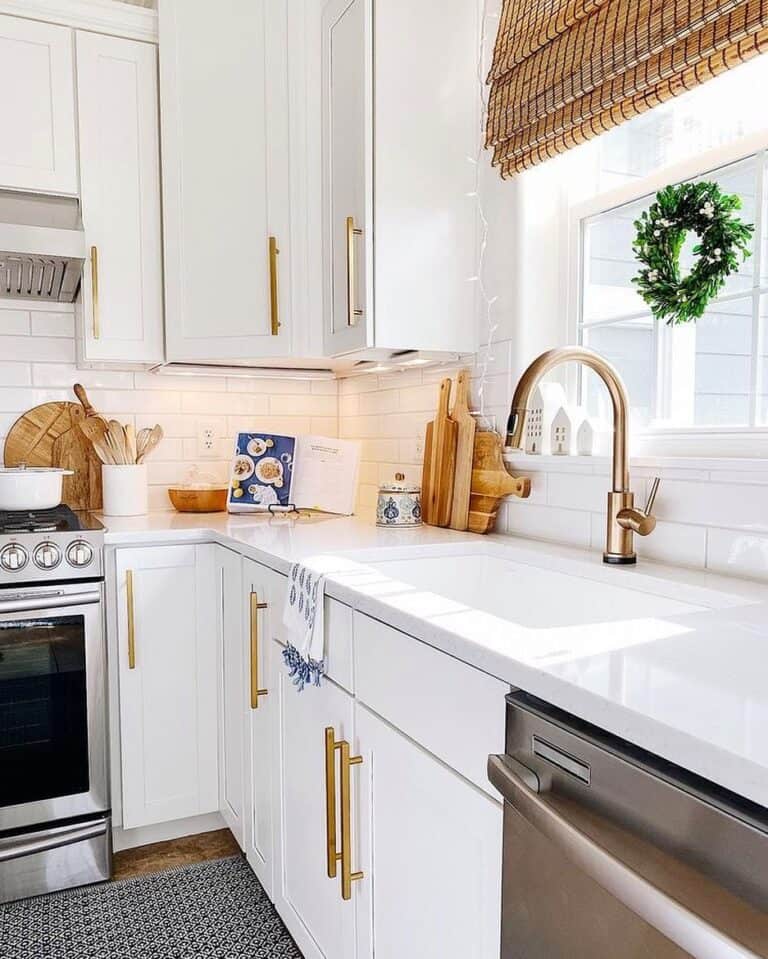 White Kitchen Sink with Gold Faucet