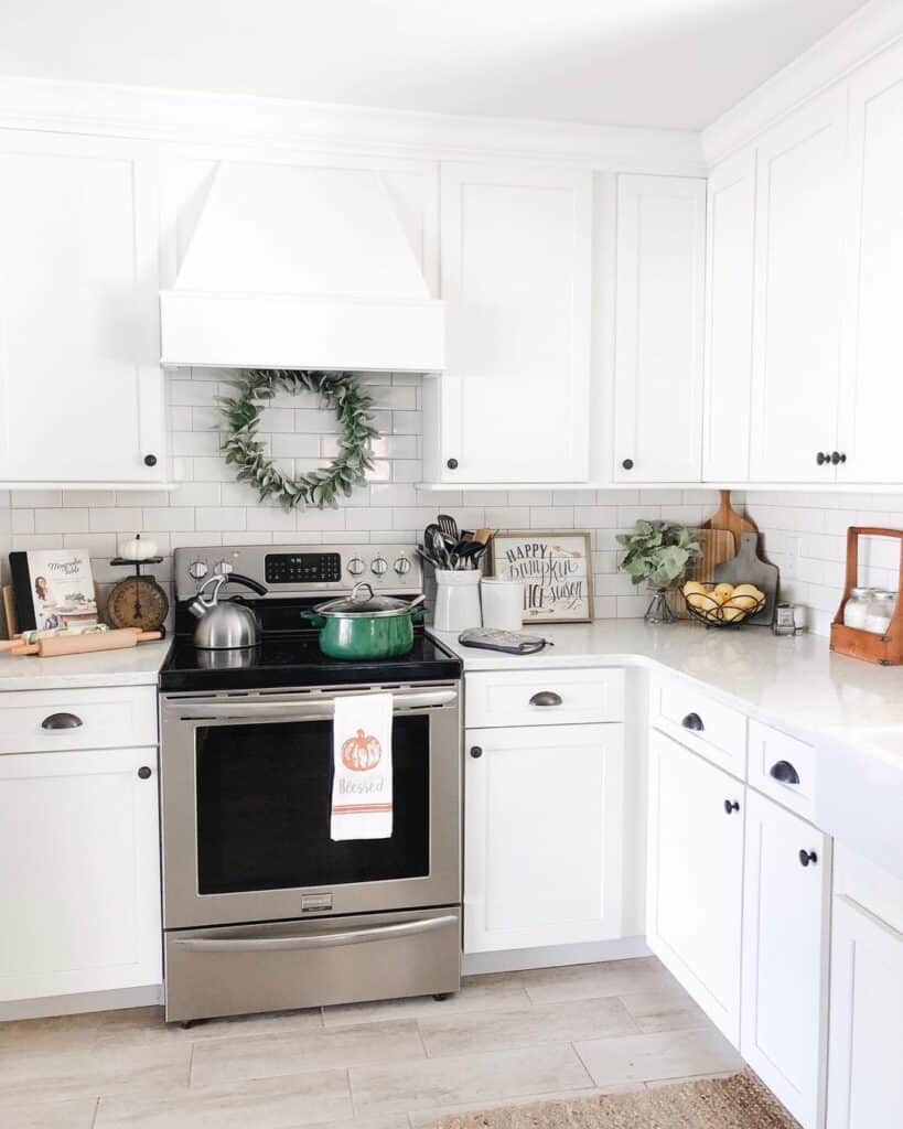 White Kitchen with Brass Cup Pulls