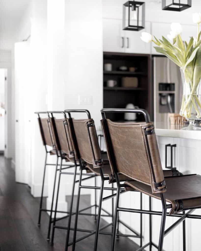White Kitchen with Brown Leather Bar Stools