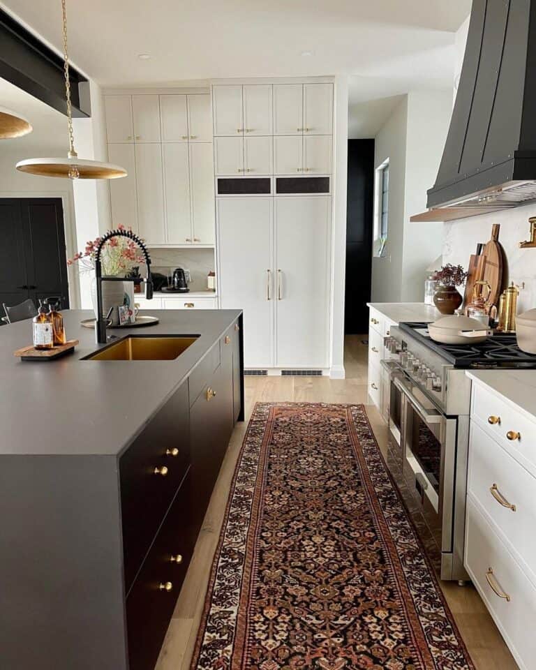 White Kitchen with Contrast Dark Island and Brass Knobs