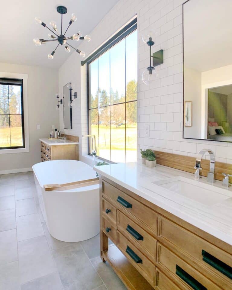 White Primary Bath with Wood Vanities and Black Cup Drawer Pulls