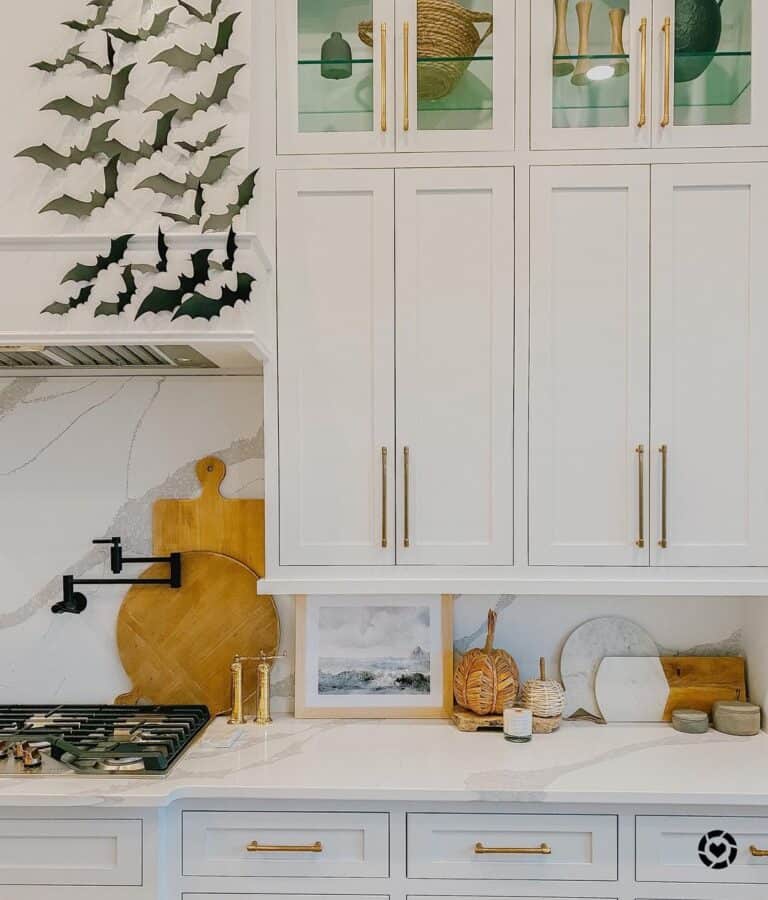 White Stone Backsplash With White Cabinets