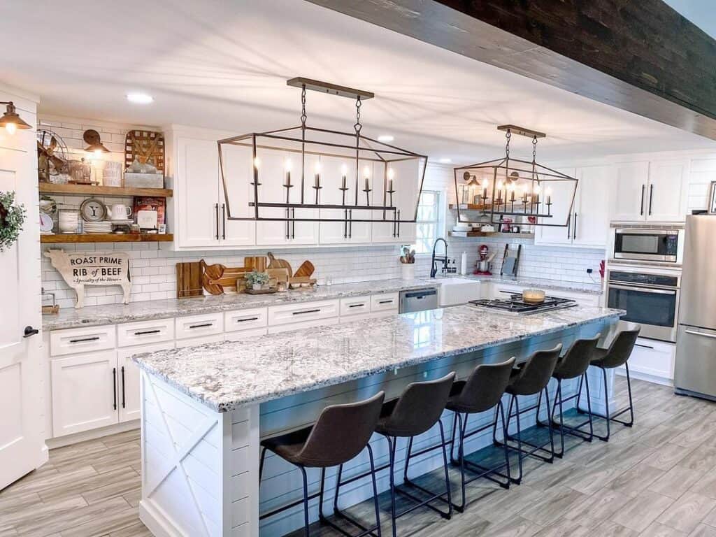 White Subway Tile Backsplash with Granite Countertops in Farmhouse Kitchen