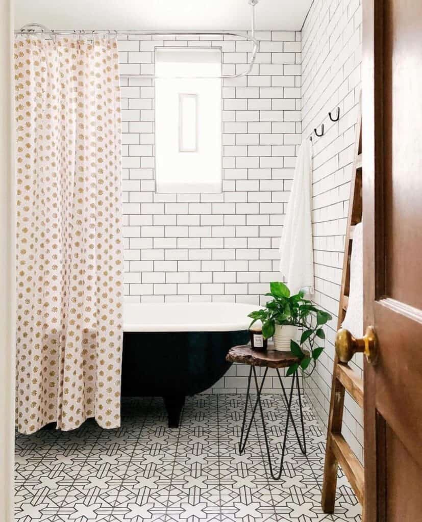 White Subway Tile Walls and a Black and White Tiled Floor