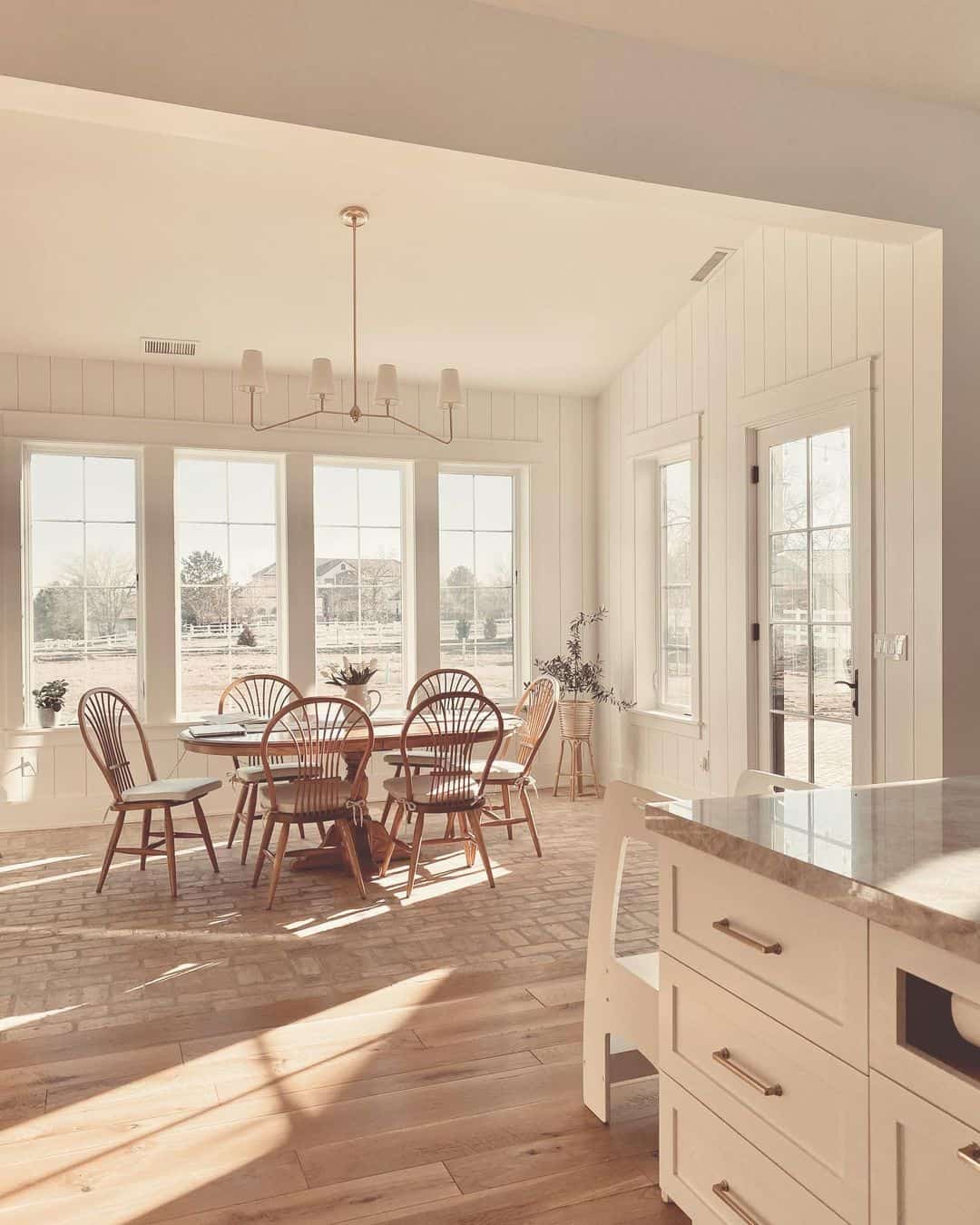 White vertical shiplap dining room soul lane