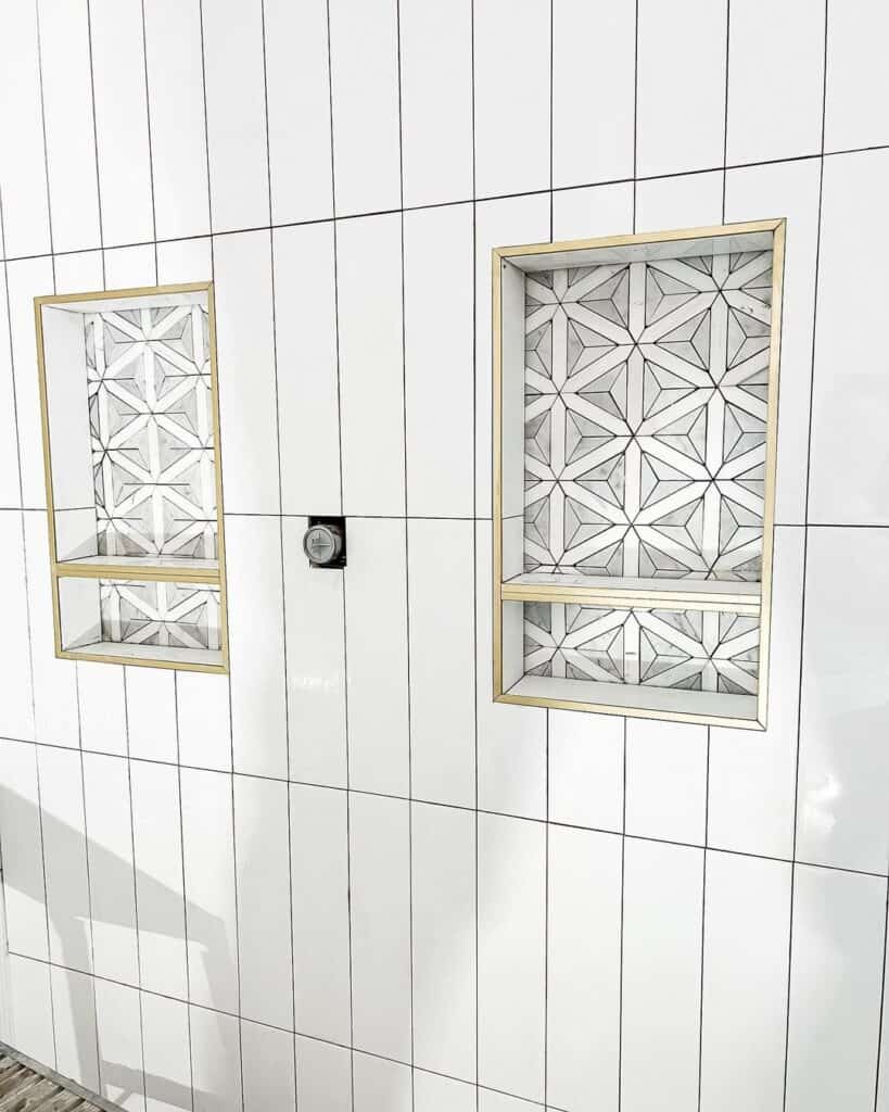 White Vertical Subway Tile Shower and Faceted Marble Soap Boxes