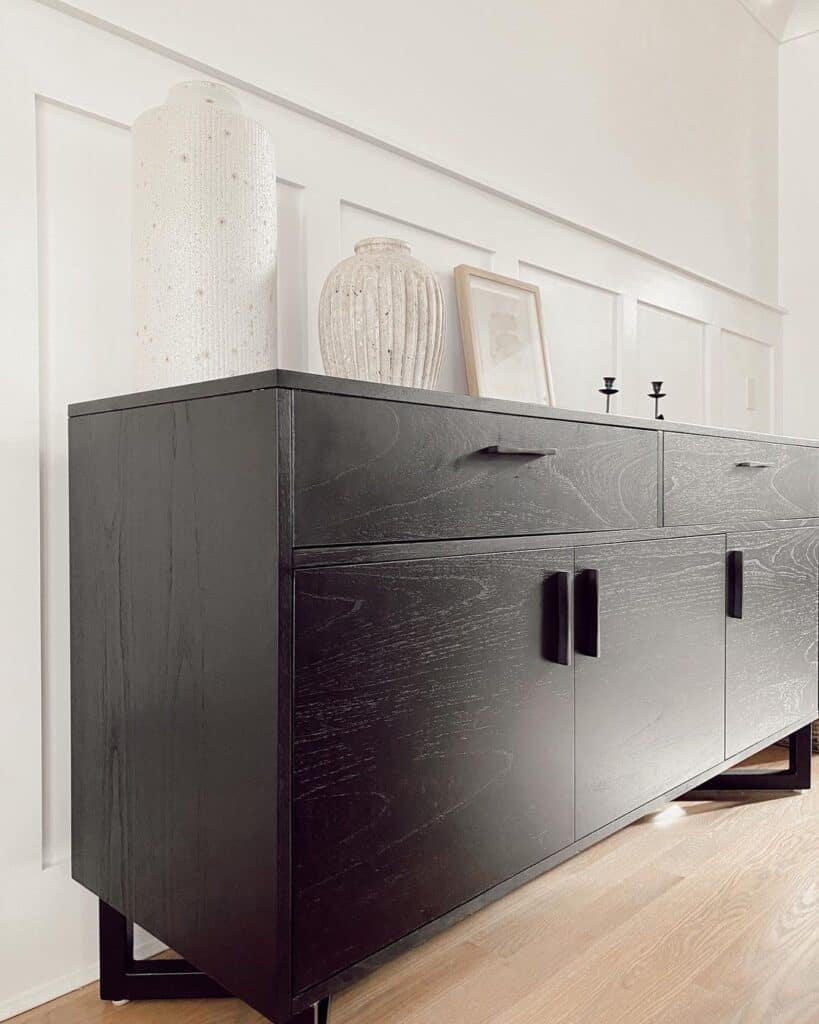 White Wainscoting and a Black Sideboard