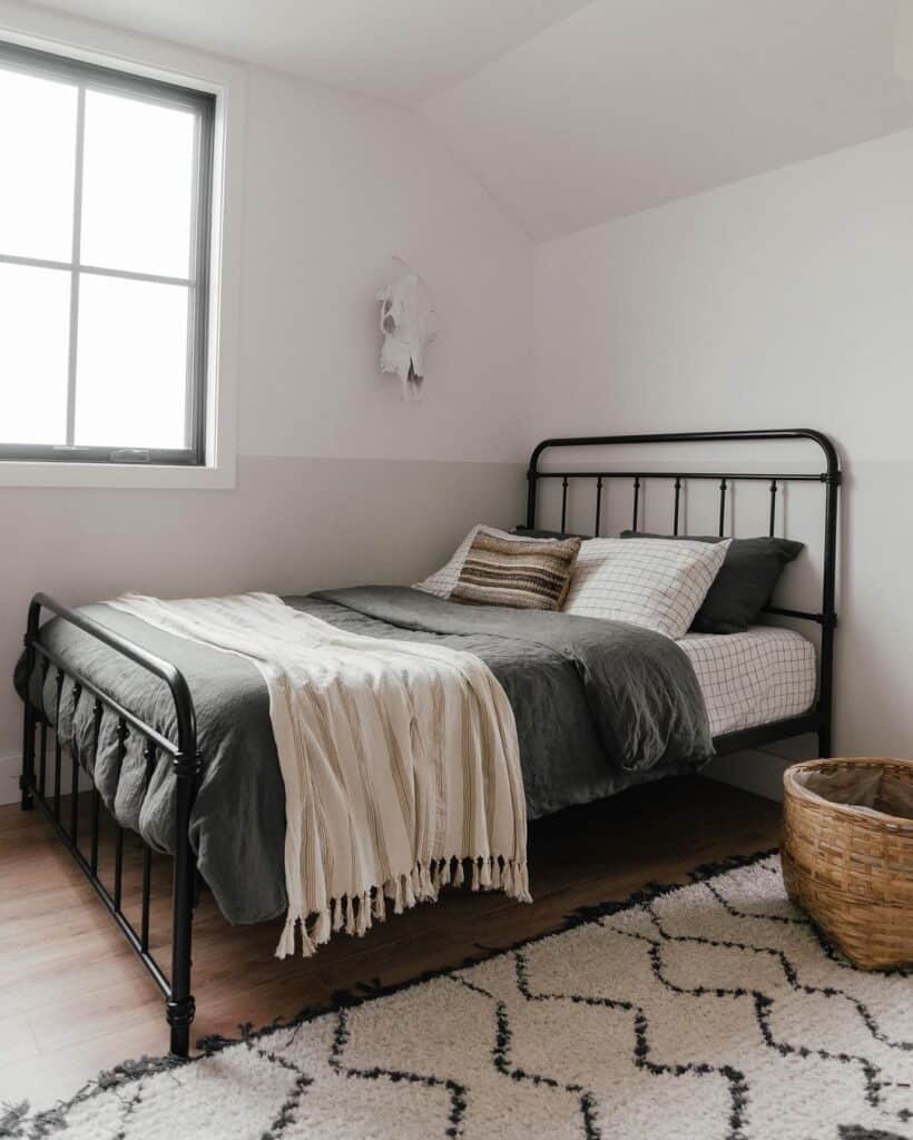 White and Gray Bedroom with Slanted Ceiling