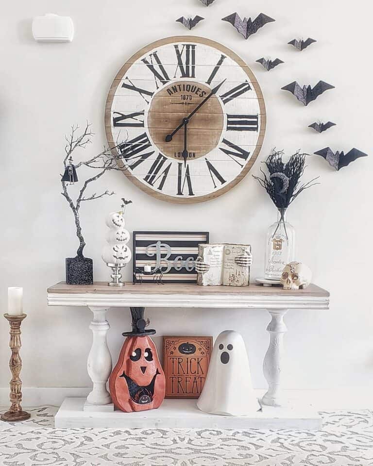 White and Wood Console with Halloween Ornaments