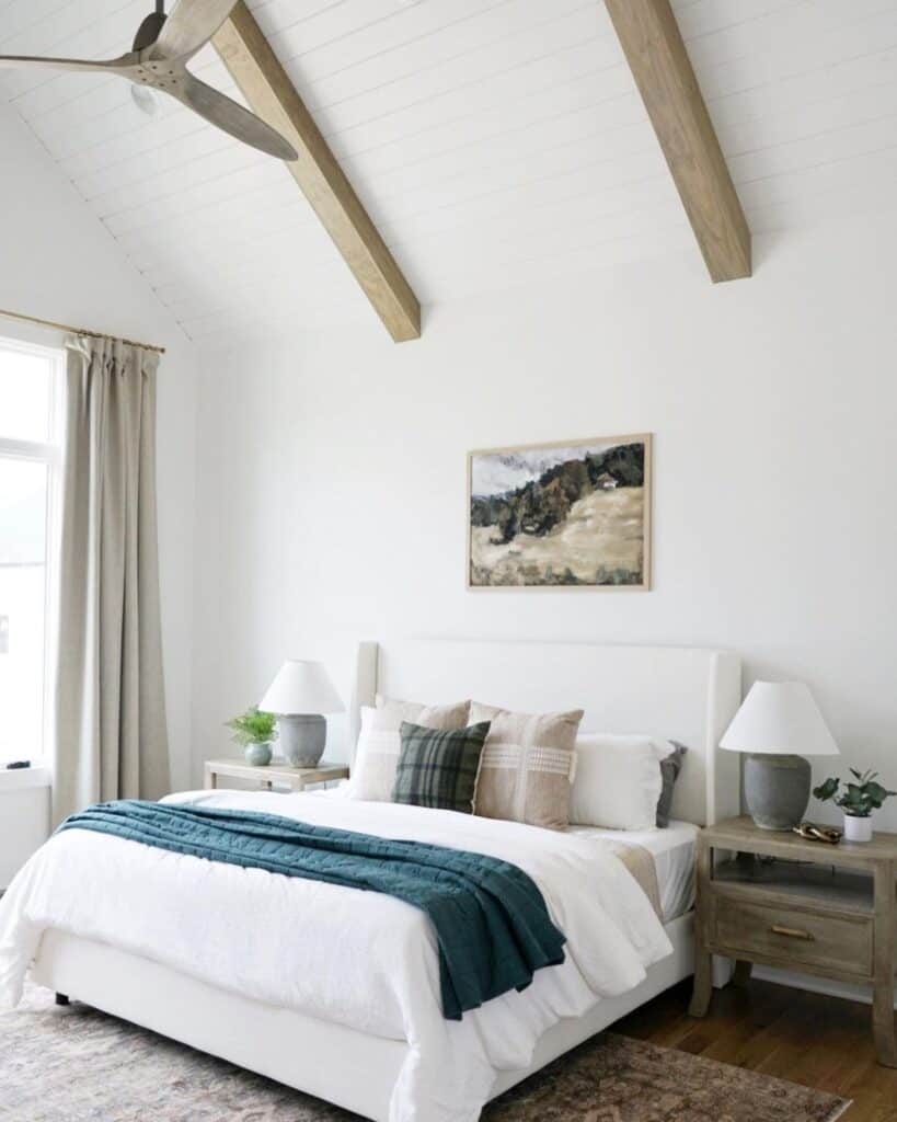 White and Wood Vaulted Ceiling Bedroom