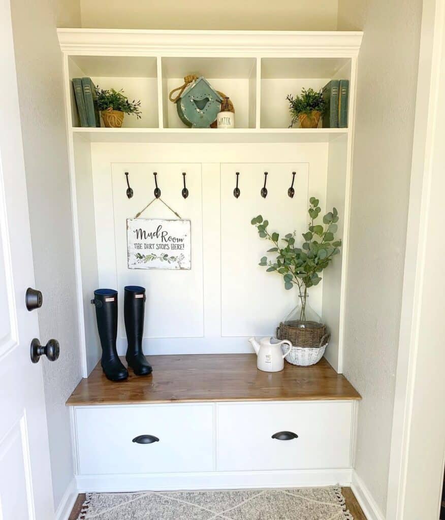 Wood Bench and Black Coat Hooks