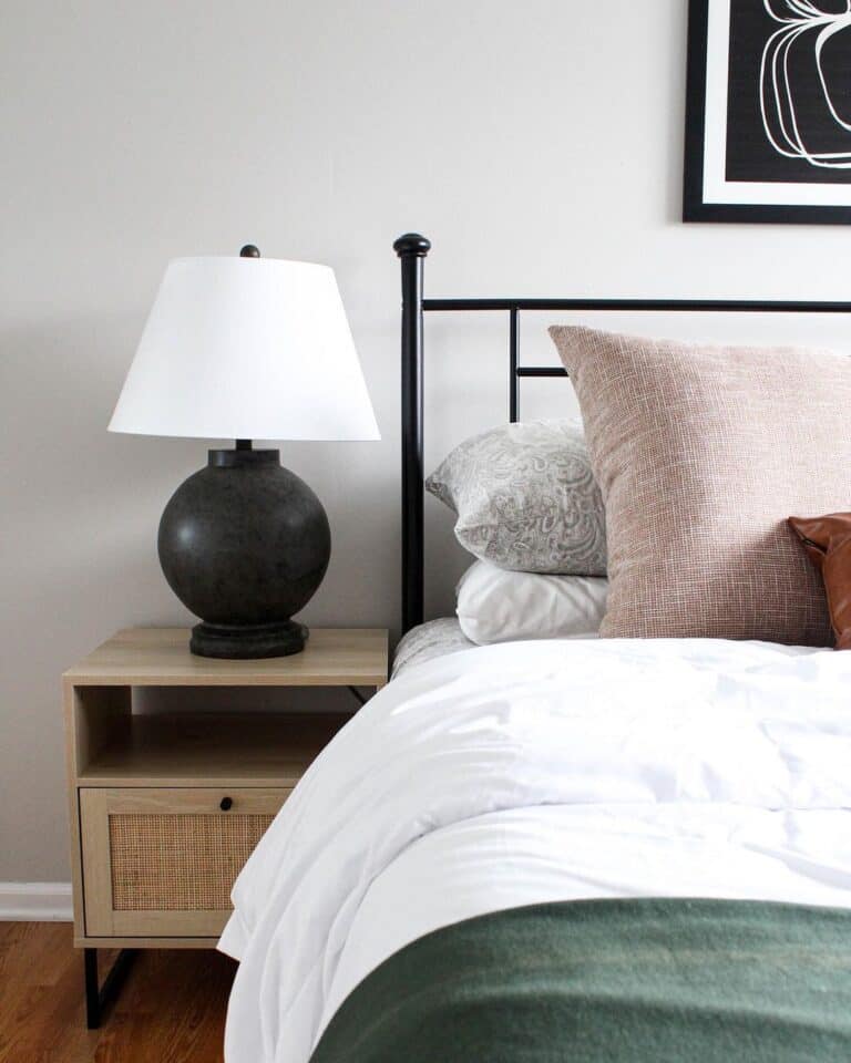 Wood Nightstand and Black Metal Headboard