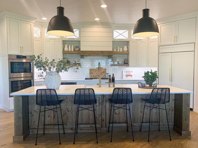 Wooden Kitchen Island with Black Bar Stools