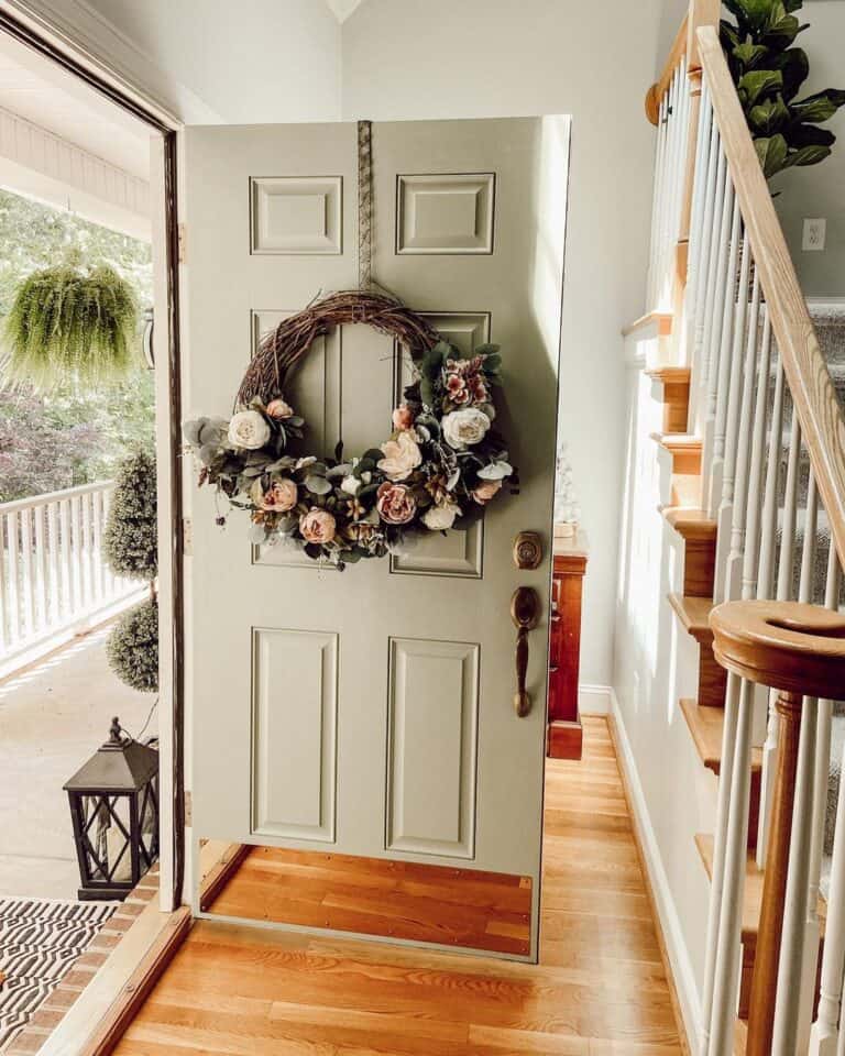 Wreath of Roses on Off-White Front Door