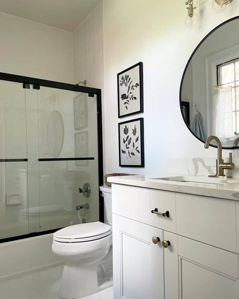 All White Bathroom with Black Frame Shower