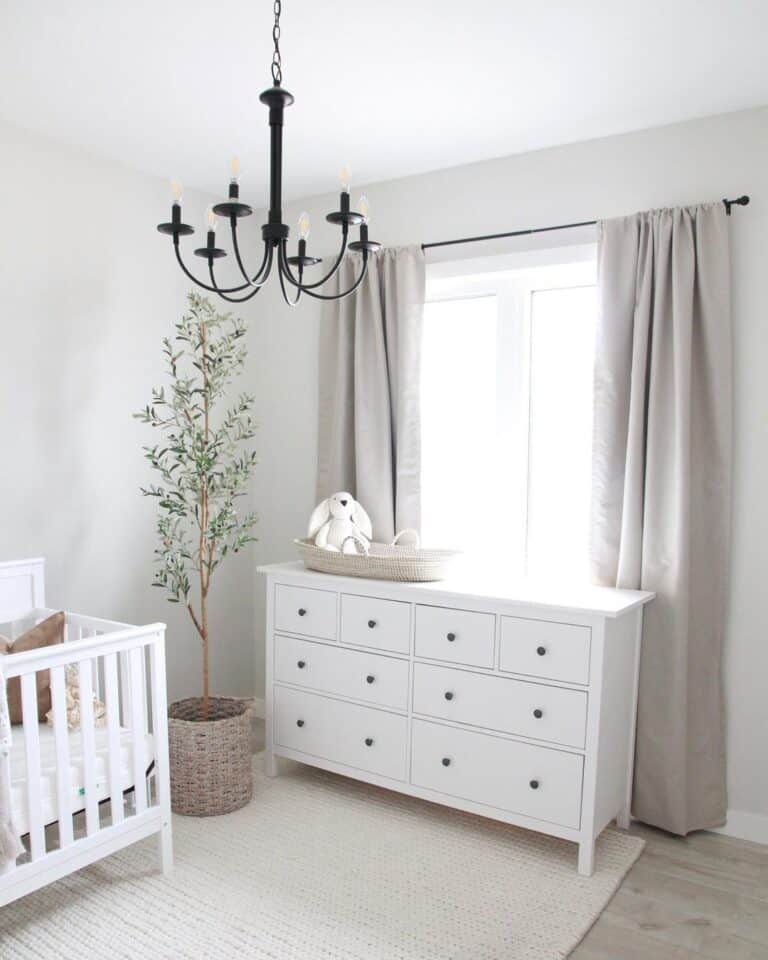 All-White Nursery with Potted Tree