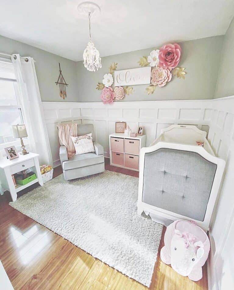 Baby Girl Nursery With a Large Pink Stuffed Horse