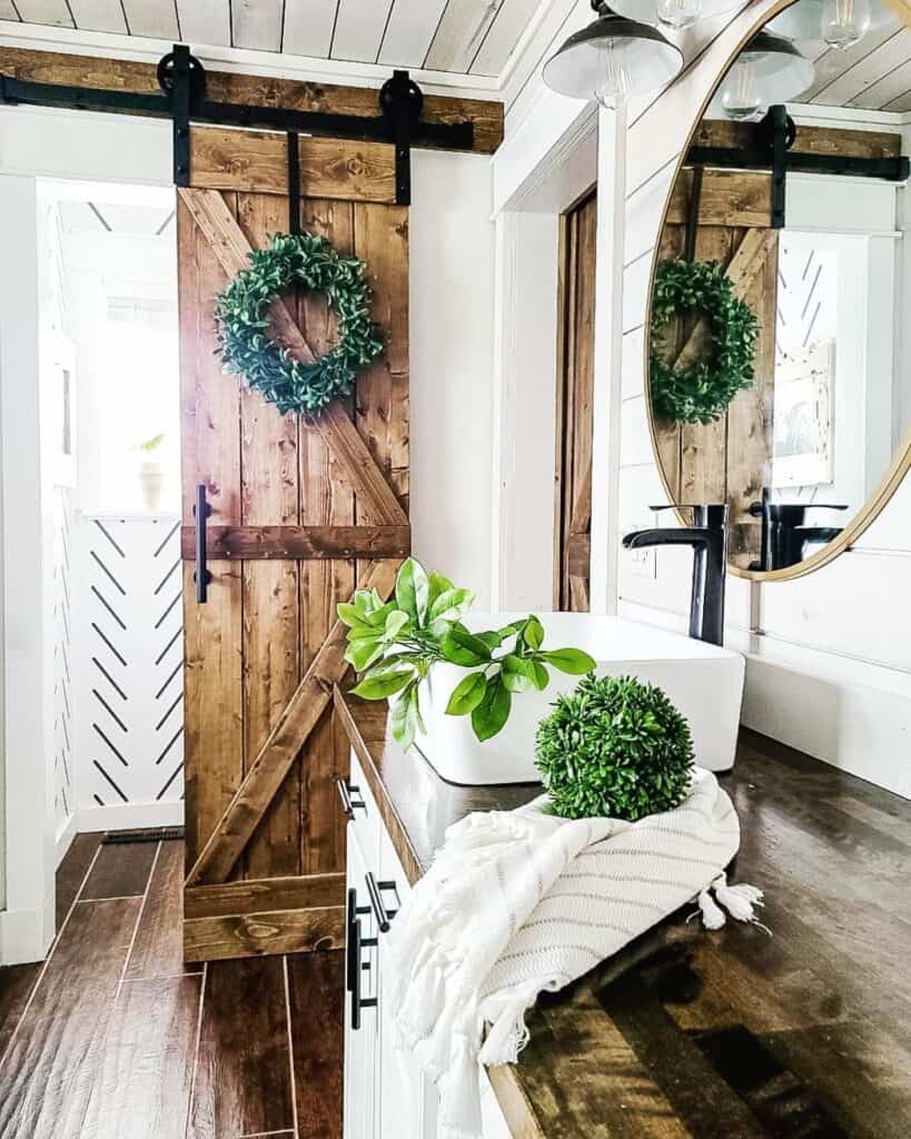 Bathroom with Barn Door and Shiplap Wall