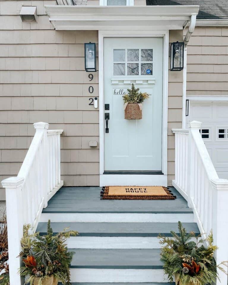 Beige Siding Porch with Layered Doormats