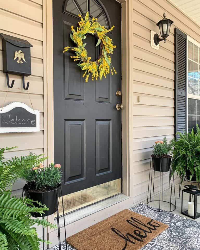 Beige Siding and Yellow Forsythia Wreath