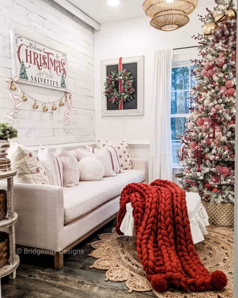 Beige Sofa and Knit Red Blanket