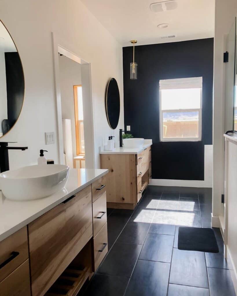 Black Accent Wall in Dark Tile Bathroom