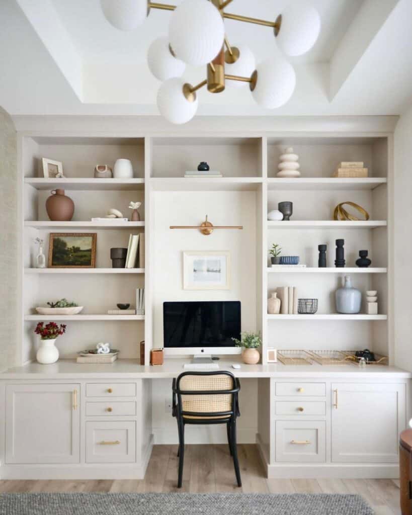 Black Cane Back Accent Chair and a White Shelving Unit