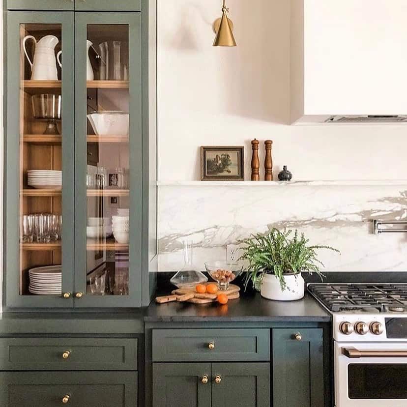 Black Countertop on Modern Sage Green Kitchen Cabinets