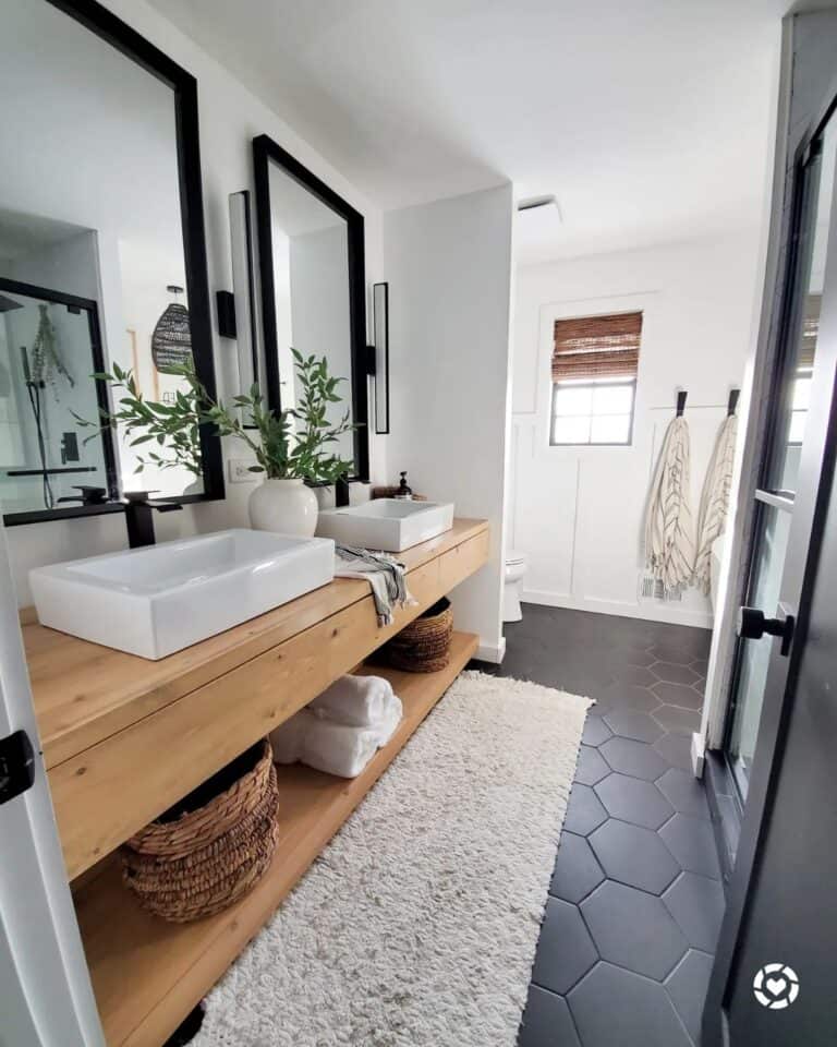 Black Hex Bathroom Floor with Floating Wood Vanity