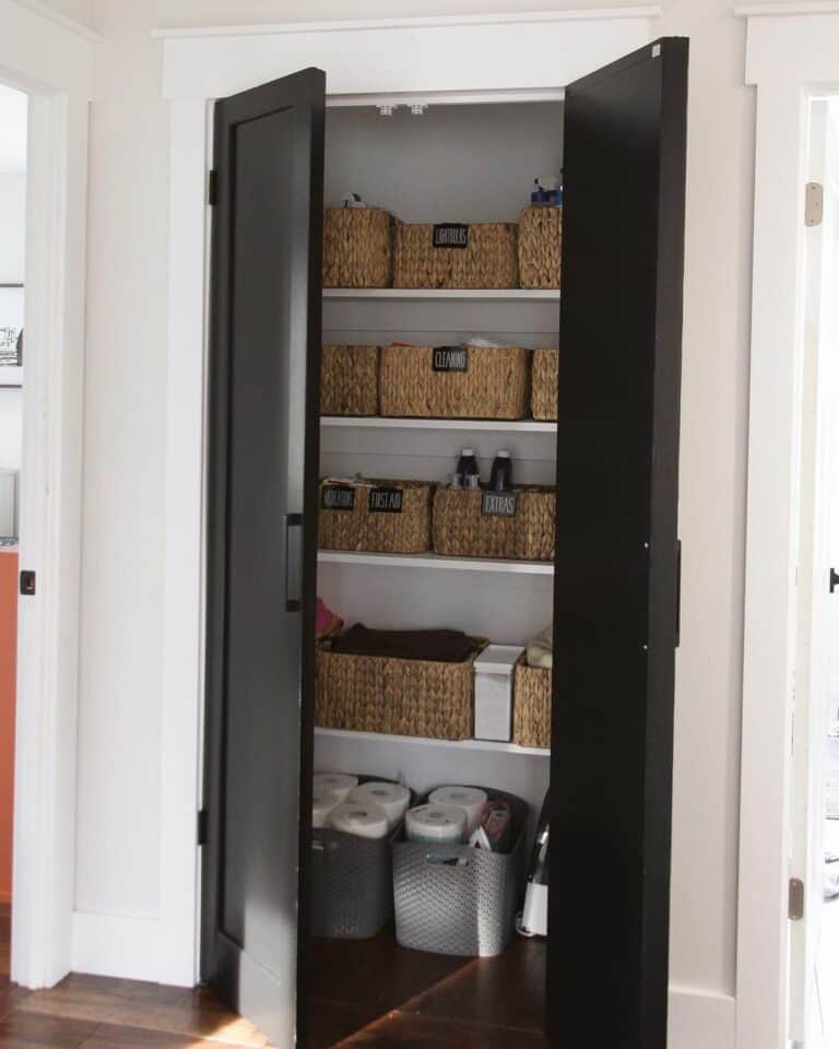Black Pantry Double Doors and Labeled Wicker Baskets