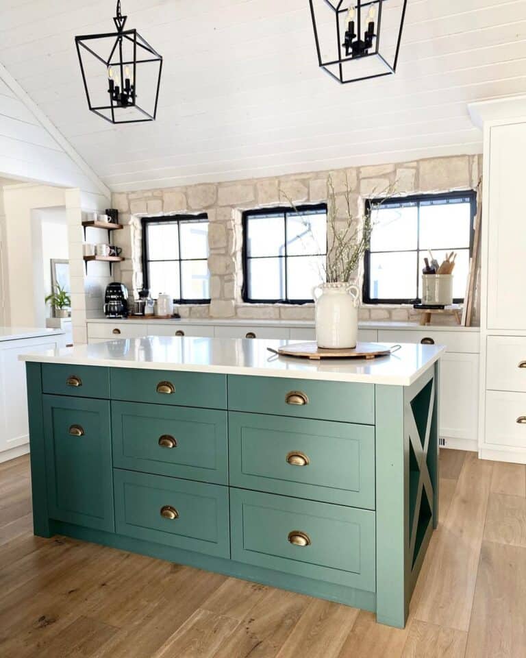 Black Pendant Lamps Above Sage Green Kitchen Cabinets