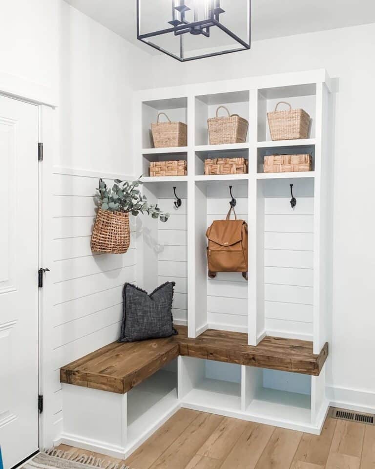 Black Pillow on an Entryway Bench With Shoe Storage