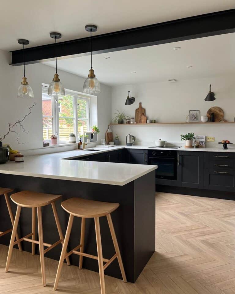Black and White Kitchen with Modern Light Wood Floors