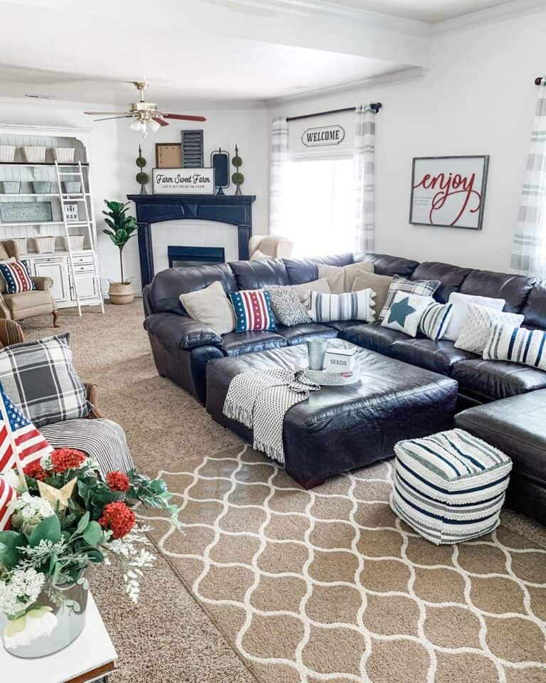 Black and White Striped Pouf in a Living Room