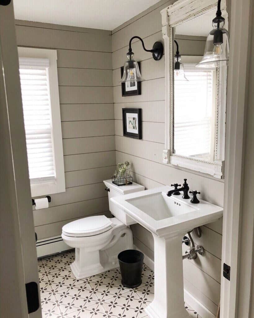 Black and White Tile Bathroom with Pedestal Sink