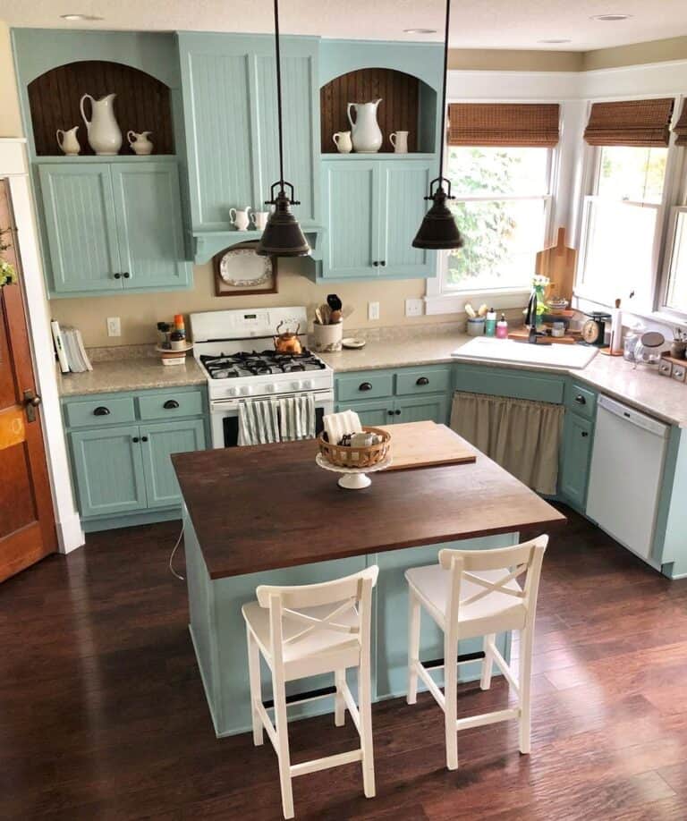 Blue Kitchen Island with White Seating