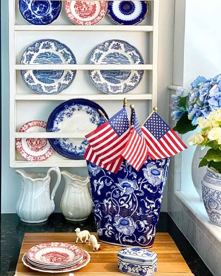 Blue Kitchen Wall Décor Above White Pitchers