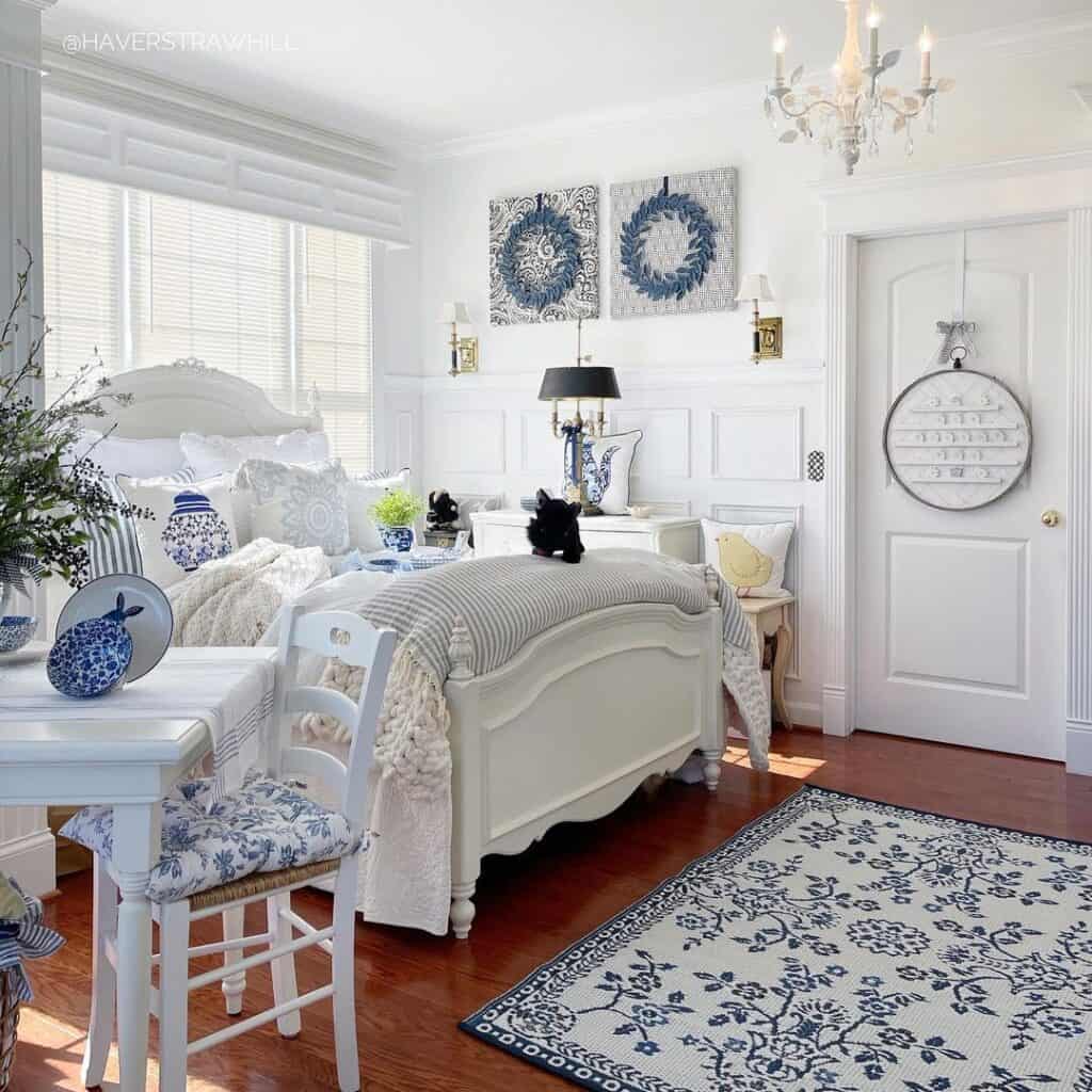 Blue and White Bedroom with Wood Flooring