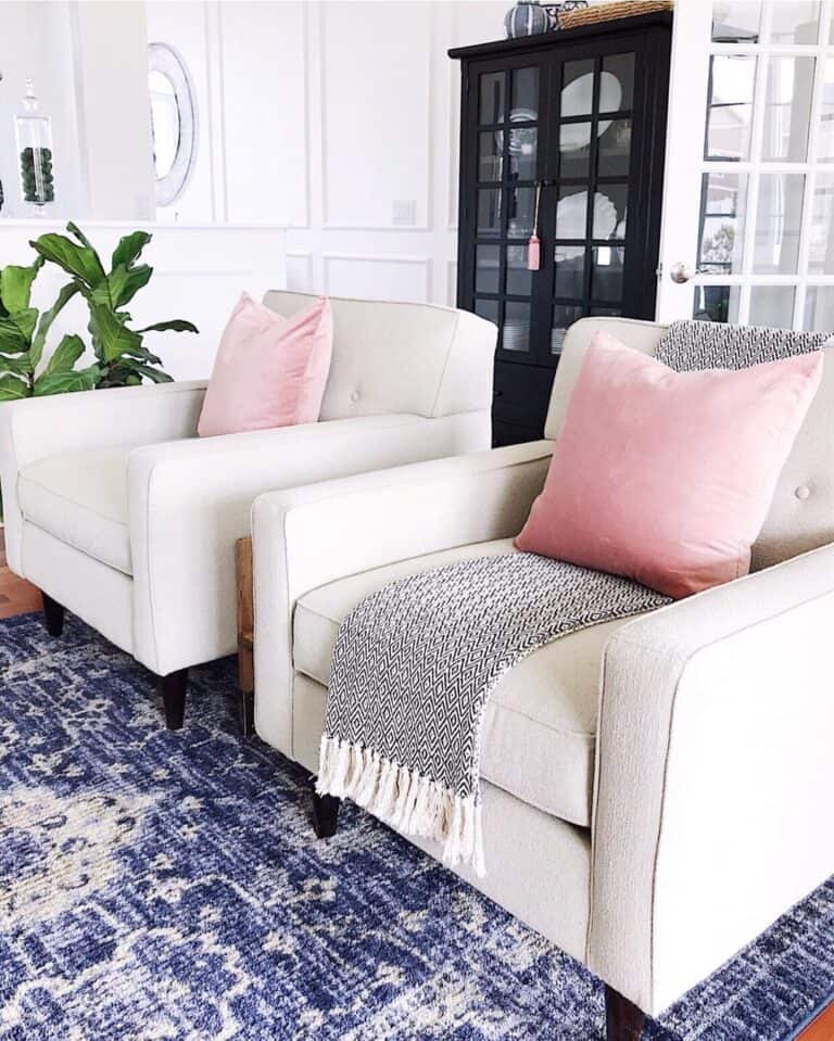 Blush Pink Throw Pillows on White Armchairs