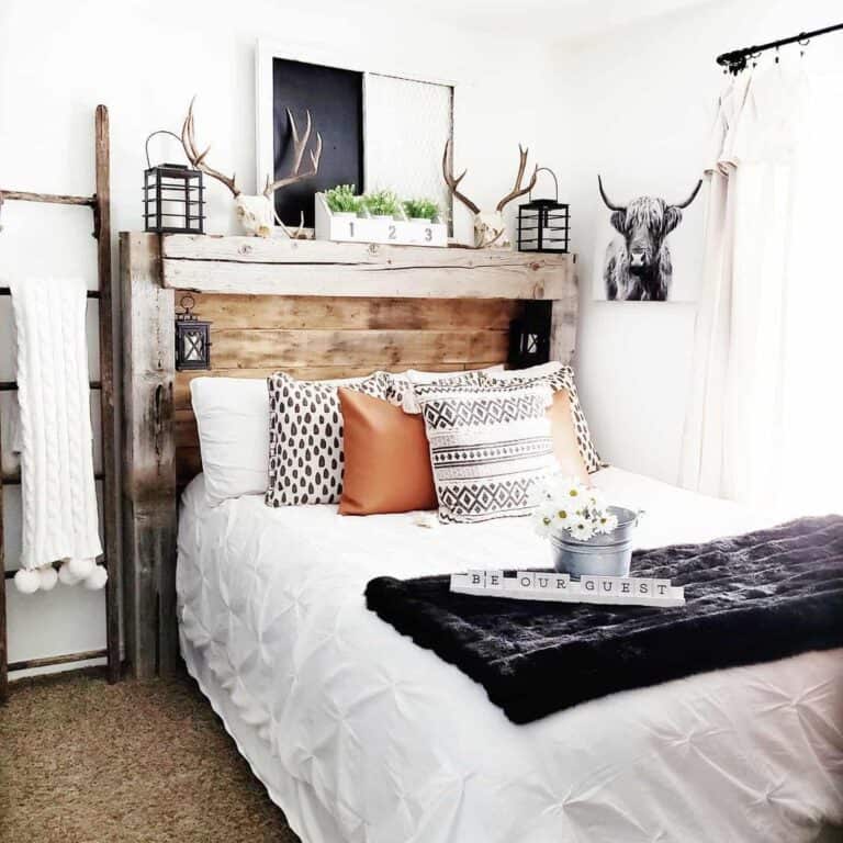 Bohemian Bedroom with Black and White Decor and a Leather Accent Pillow