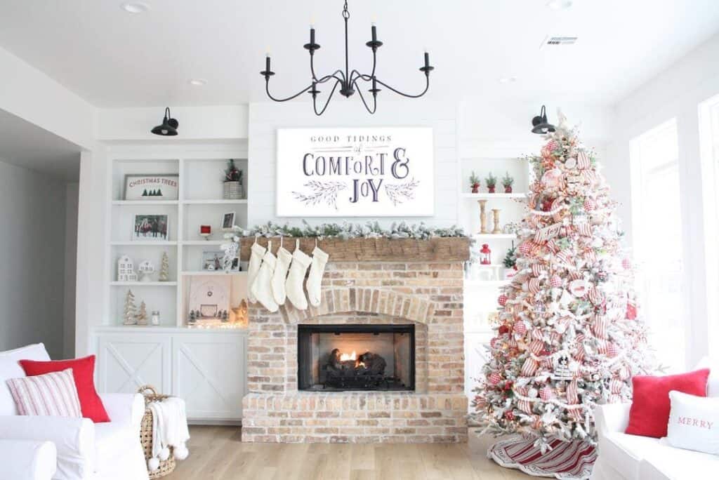 Brick Fireplace with Red and White Christmas Tree